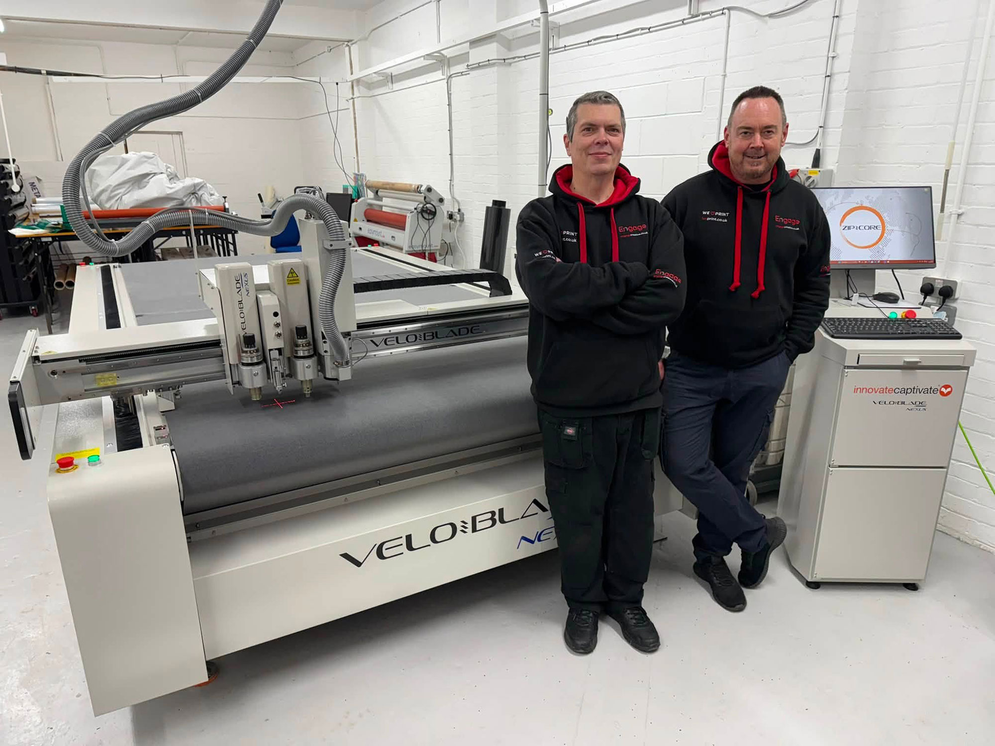 The staff at Luv Print on the Veloblade